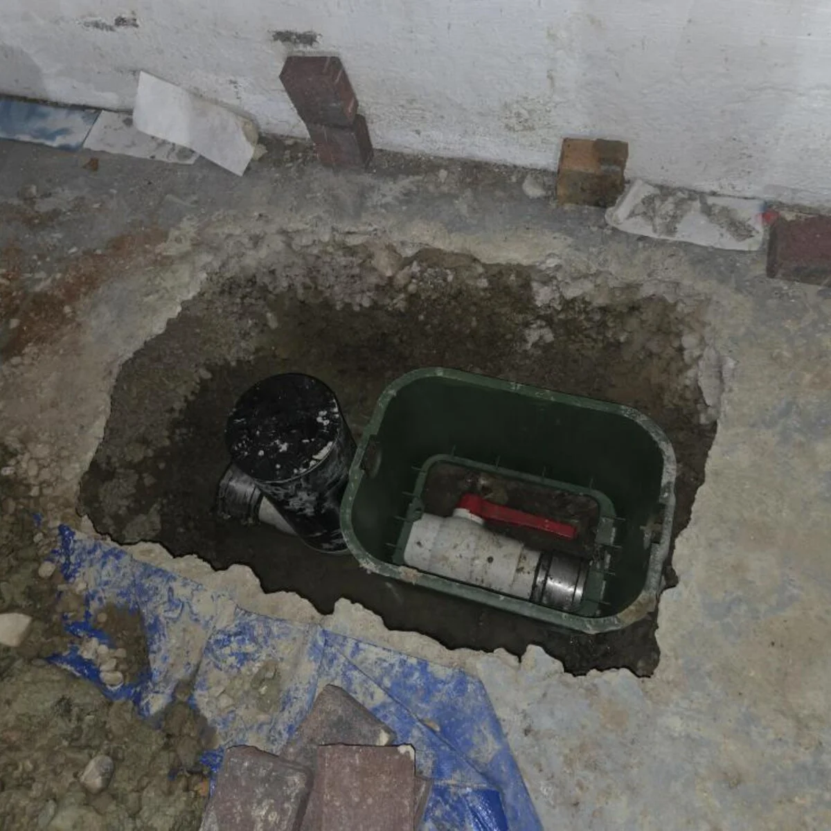 Backwater valve installed in its access box under the basement floor in Centerville, Ohio
